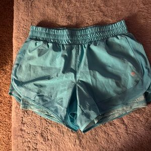 athletic shorts with built in tight shorts underneath